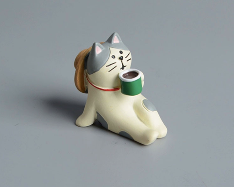 Tedrikkende katt, figurin